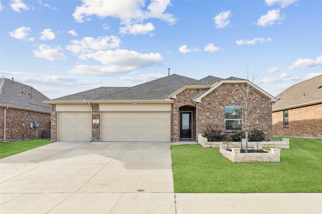 ranch-style home featuring a front lawn, a garage, and central AC