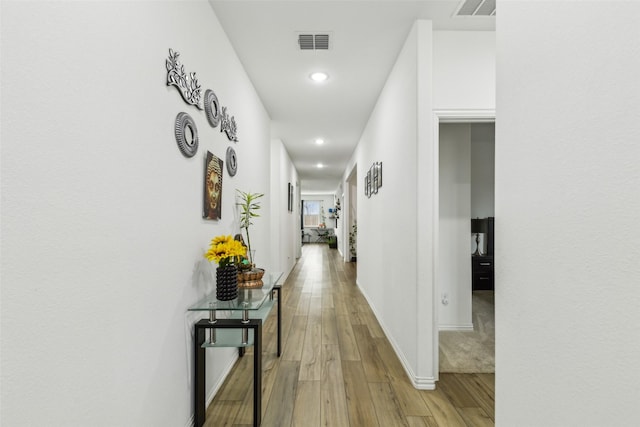 hall featuring hardwood / wood-style floors