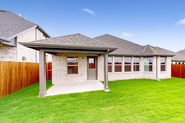 789 Merry Summit Rd, Lavon, TX 75166 - rear view of property with a yard, a shingled roof, and a fenced backyard