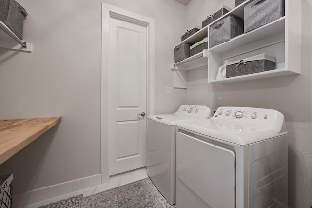 laundry area with washer and dryer