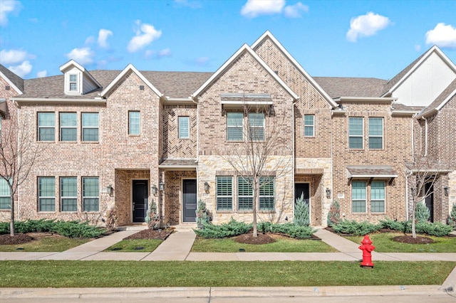 view of property with a front lawn