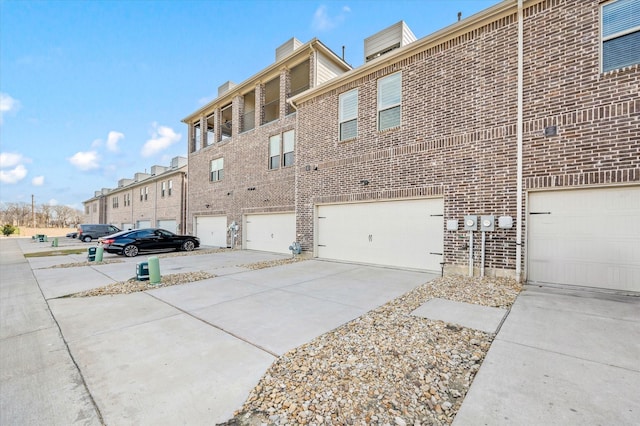 view of property exterior with a garage