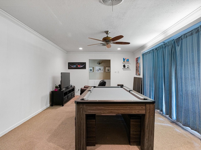 playroom featuring light carpet, crown molding, billiards, ceiling fan, and a textured ceiling