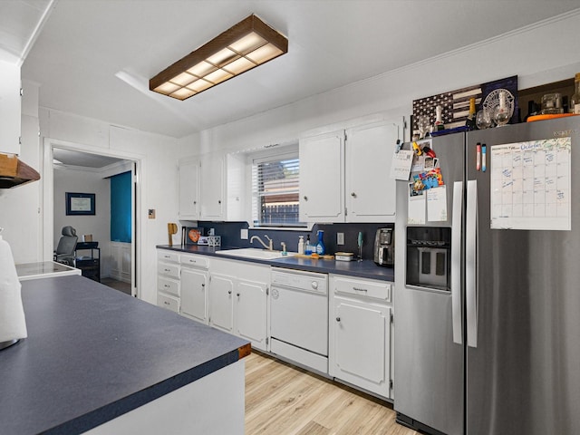 kitchen featuring dishwasher, white cabinets, sink, light hardwood / wood-style floors, and stainless steel fridge with ice dispenser