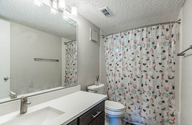 full bathroom featuring a textured ceiling, vanity, shower / tub combo, and toilet