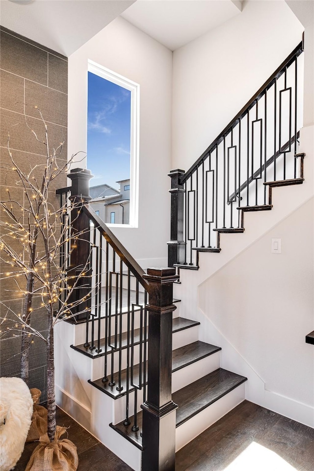 stairway with wood-type flooring