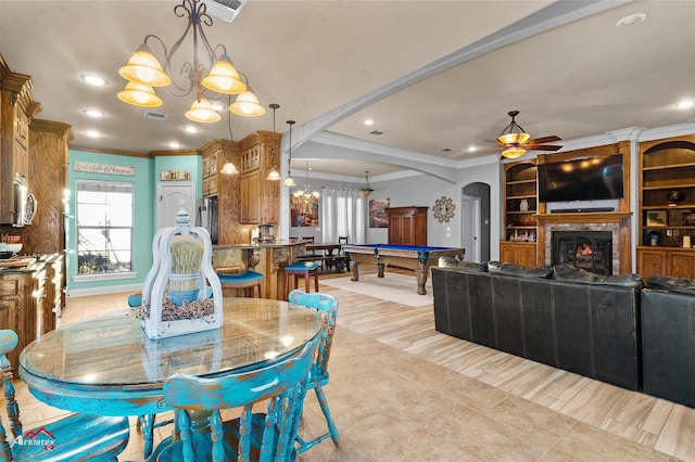 dining room featuring ceiling fan with notable chandelier, light tile patterned floors, ornamental molding, and pool table