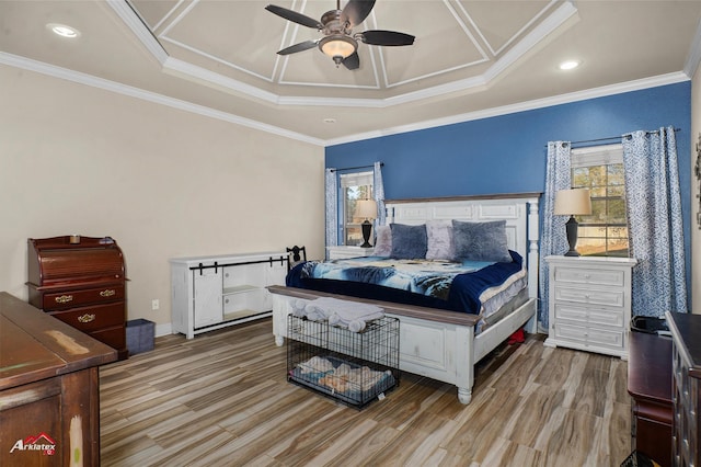 bedroom featuring ceiling fan, wood-type flooring, and ornamental molding