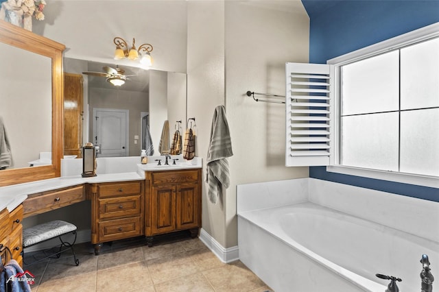 bathroom featuring tile patterned floors, ceiling fan, vanity, and a bath