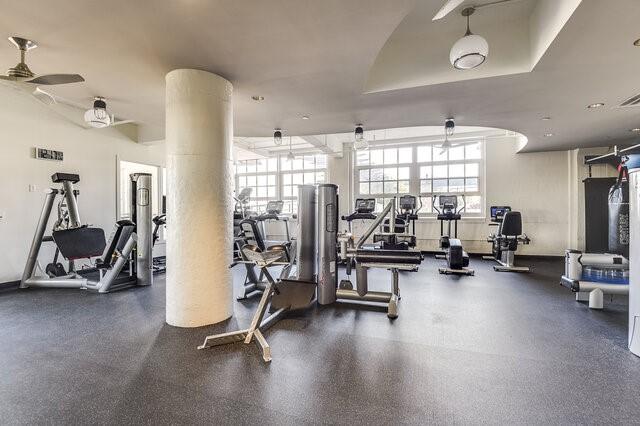 gym featuring ceiling fan