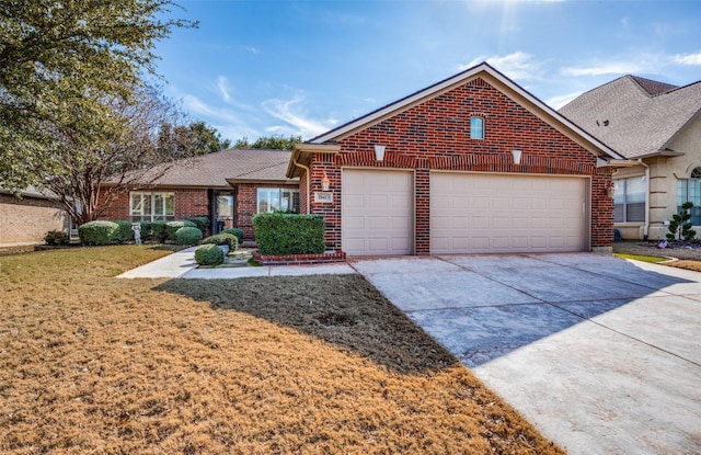 ranch-style house with an attached garage, brick siding, concrete driveway, roof with shingles, and a front lawn