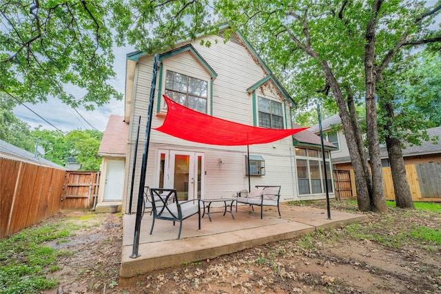 6010 Paradise Dr, Arlington, TX 76001 - rear view of property with a patio and a fenced backyard