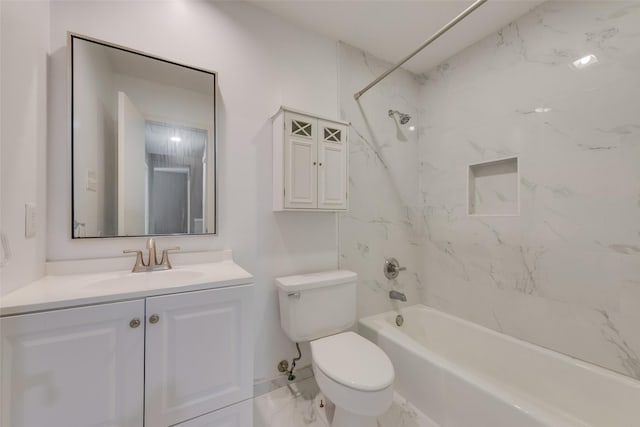 bathroom with marble finish floor, tub / shower combination, toilet, and vanity