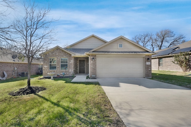 view of front of property featuring a garage and a front yard