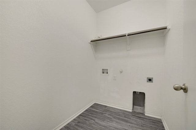 washroom featuring washer hookup, dark hardwood / wood-style floors, hookup for an electric dryer, and gas dryer hookup