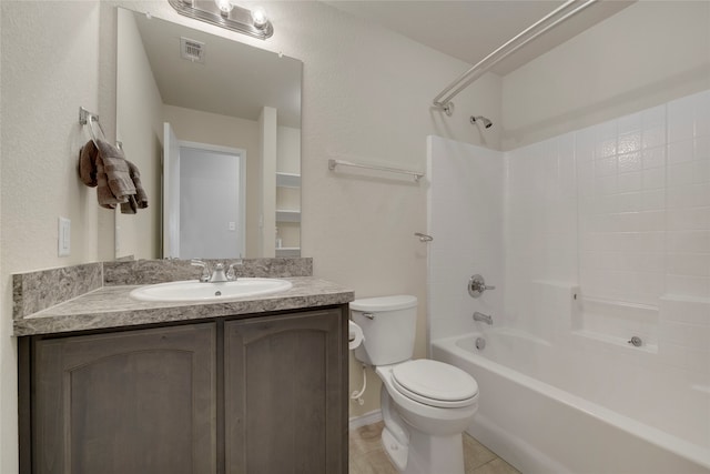 full bathroom with tile patterned flooring, toilet, vanity, and  shower combination