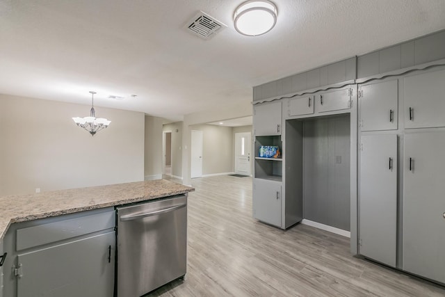 kitchen featuring gray cabinetry, a textured ceiling, light wood-type flooring, hanging light fixtures, and stainless steel dishwasher