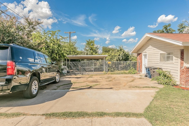 view of car parking featuring a carport