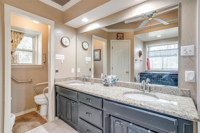 bathroom with ceiling fan, tile patterned flooring, crown molding, toilet, and vanity