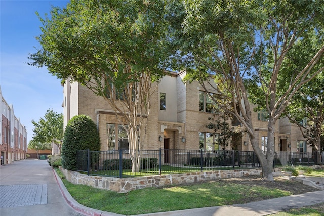 view of front of home with a front lawn