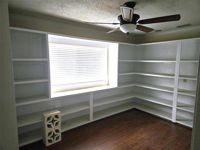 interior space with ceiling fan