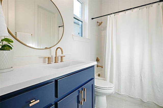 full bathroom with shower / tub combo, tile patterned flooring, vanity, and toilet