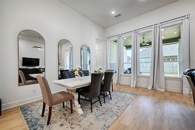 dining area featuring light hardwood / wood-style floors and a healthy amount of sunlight