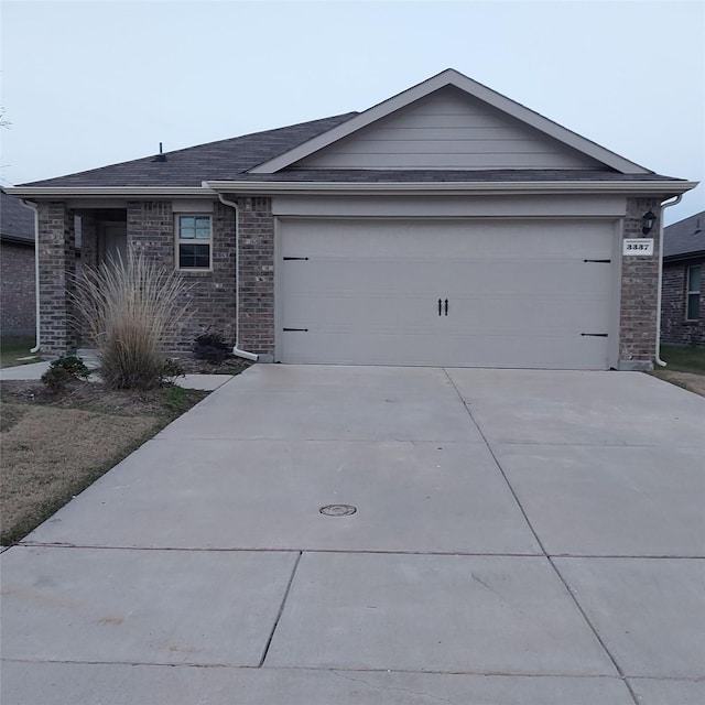 single story home featuring a garage