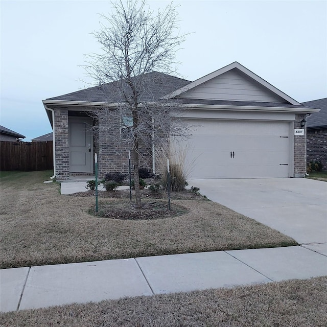 single story home with a garage