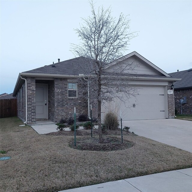 ranch-style home with a garage