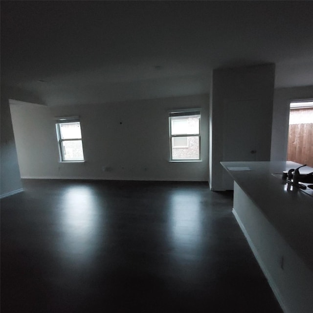 unfurnished room featuring a wealth of natural light