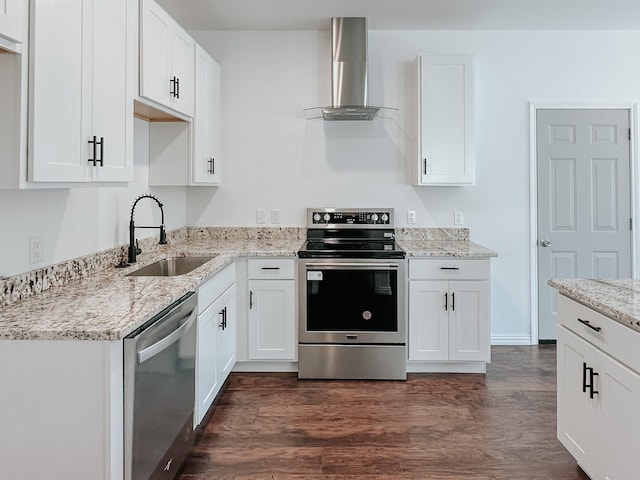 kitchen with white cabinetry, sink, wall chimney exhaust hood, and stainless steel appliances