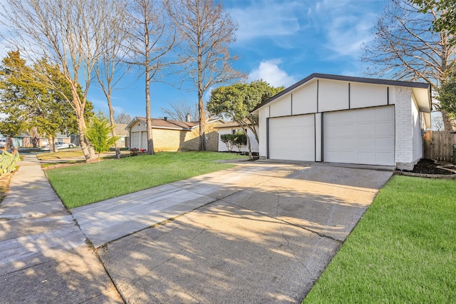 garage with a lawn