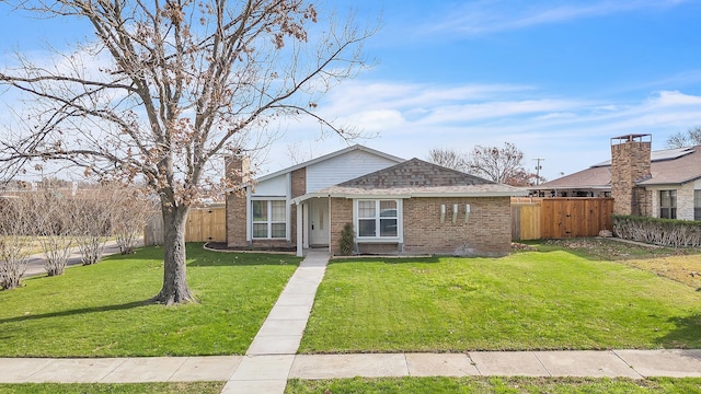 view of front of property with a front lawn