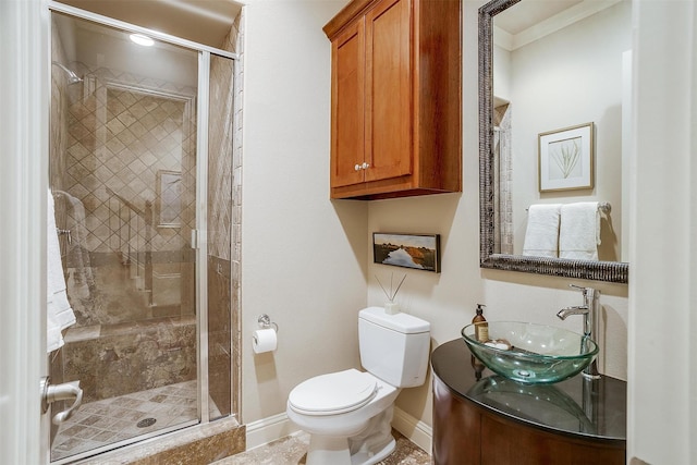 bathroom featuring vanity, toilet, and walk in shower