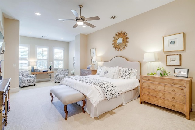 carpeted bedroom with ceiling fan