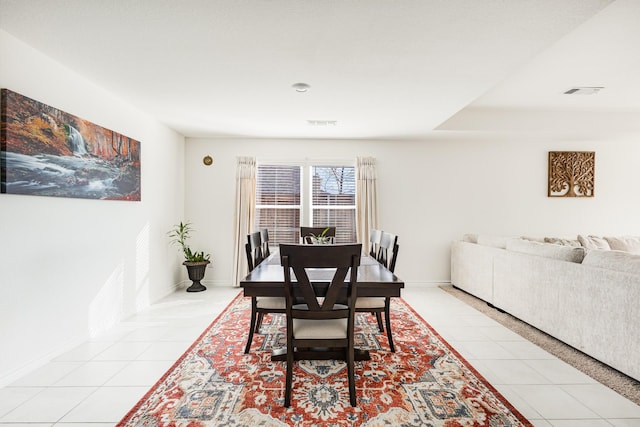 dining room with light tile patterned floors