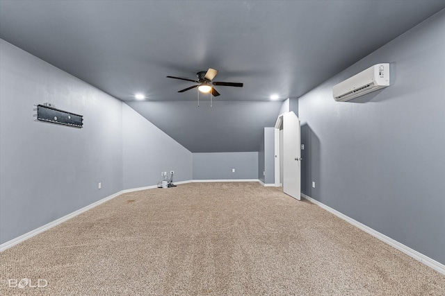 bonus room with an AC wall unit, ceiling fan, and carpet