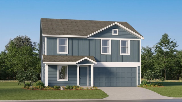 view of front of property with a garage and a front lawn