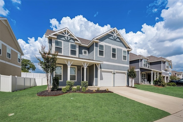 view of front of house with a garage and a front yard