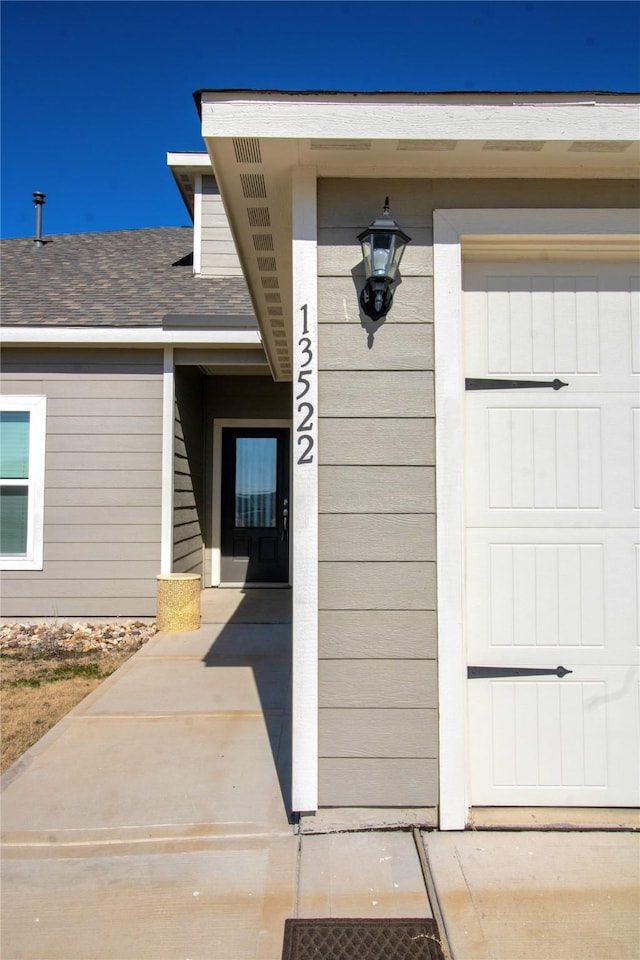 entrance to property with a garage