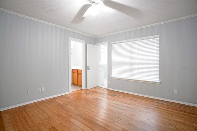 unfurnished room with crown molding, a textured ceiling, ceiling fan, and light hardwood / wood-style flooring