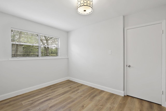 empty room featuring hardwood / wood-style floors