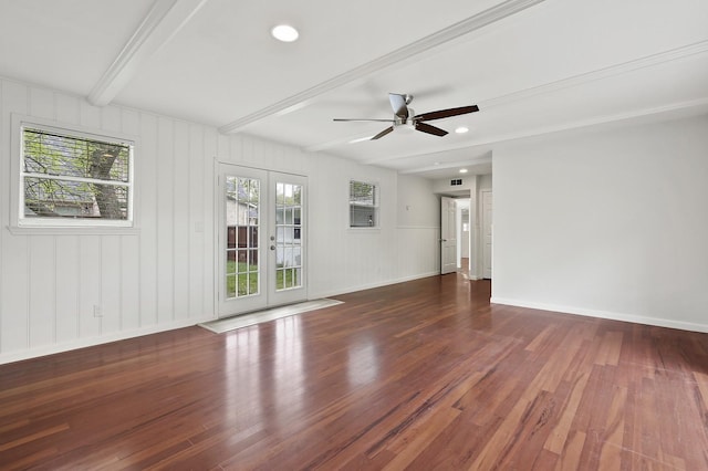 unfurnished room featuring ceiling fan, french doors, beamed ceiling, and dark hardwood / wood-style floors