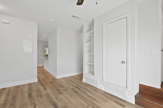 corridor featuring light wood-type flooring