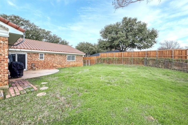 view of yard with a patio area