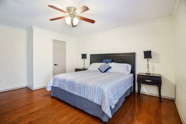 bedroom featuring dark hardwood / wood-style flooring, ceiling fan, crown molding, and a textured ceiling