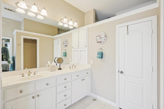 bathroom featuring tile patterned floors and vanity