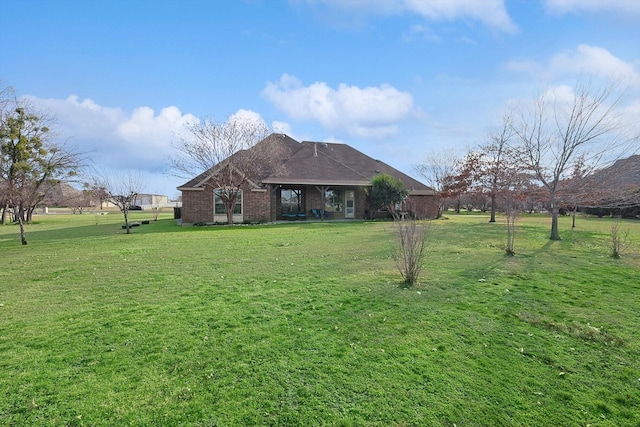 view of front facade with a front yard