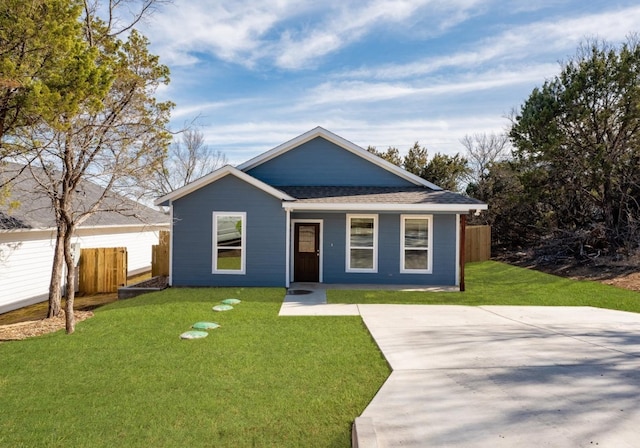 ranch-style house featuring a front lawn